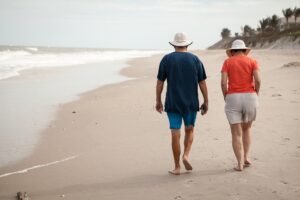 Older Couple Walking on the Beach
