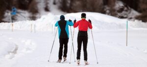 Two people skiing