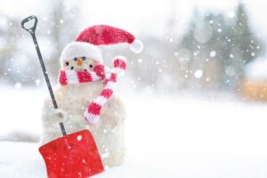 Winter Scene with Snowman and Shovel