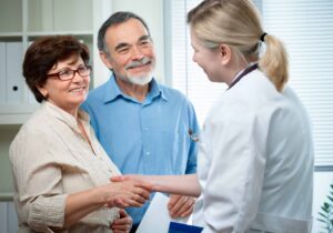 Doctor Shaking Hand with Patients