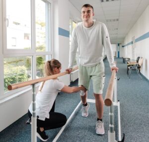 Patient and physical therapist working on MCL injury recovery therapy