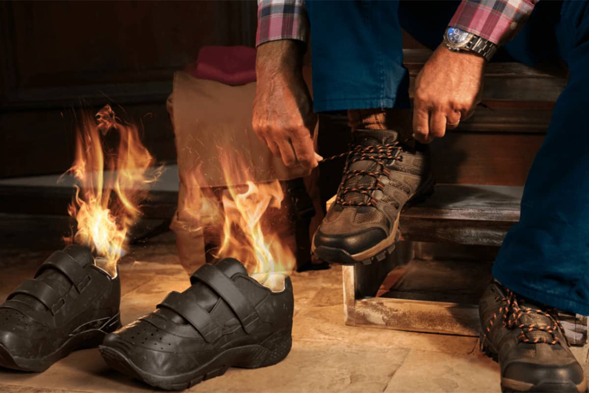 Spinal Cord Stimulation (SCS) for Diabetic Neuropathy. Man in flannel and jeans putting on new shoes while old shoes are on fire representing diabetic neuropathy
