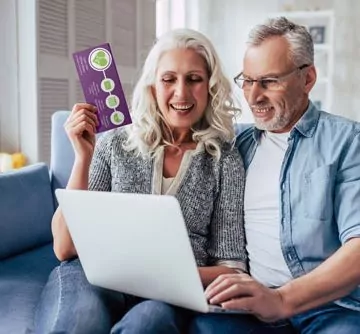 Older Couple Reviewing Orthopaedic Options on Computer
