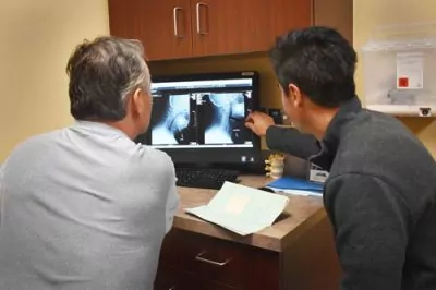 Dr. Sung showing x-ray